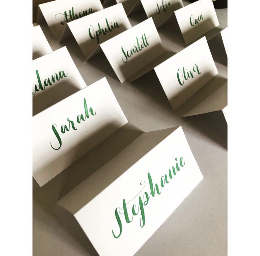 Calligraphy on cards in rows
